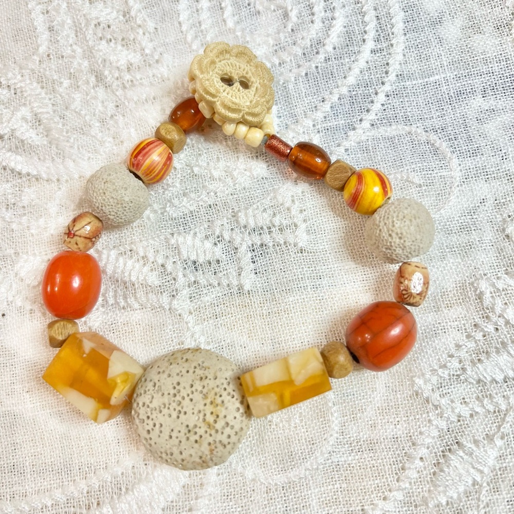 Boho bracelet 9 ½” Lava stone, acrylics, wood, glass beads.